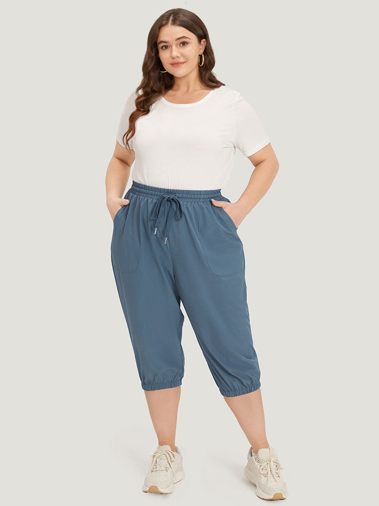 Solid Elastic Waist Drawstring Slant Pocket Cropped Pants